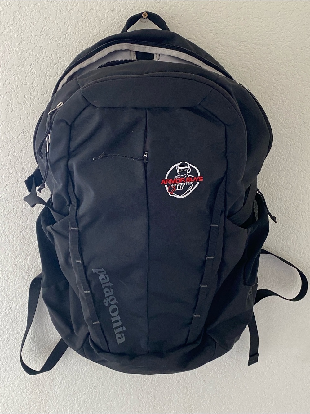 Patagonia Refugio 28L Black Backpack with Armor Guys Embroidery